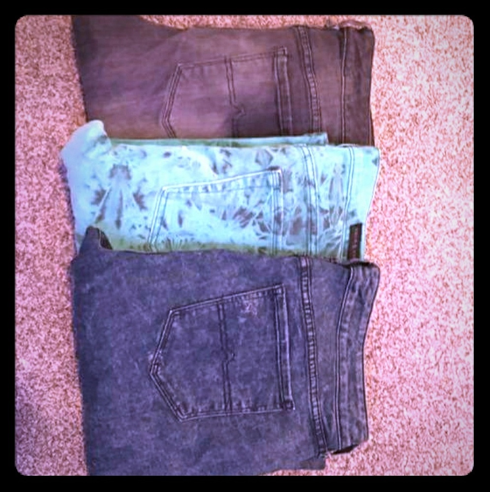 Three pairs of denim skinny jeans
